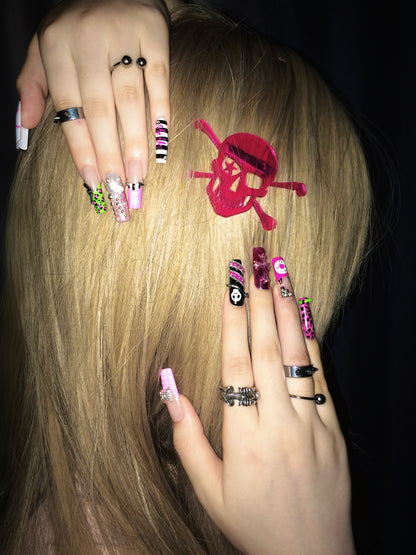 Original press-on nails featuring a Y2K-inspired retro style with leopard print and studs