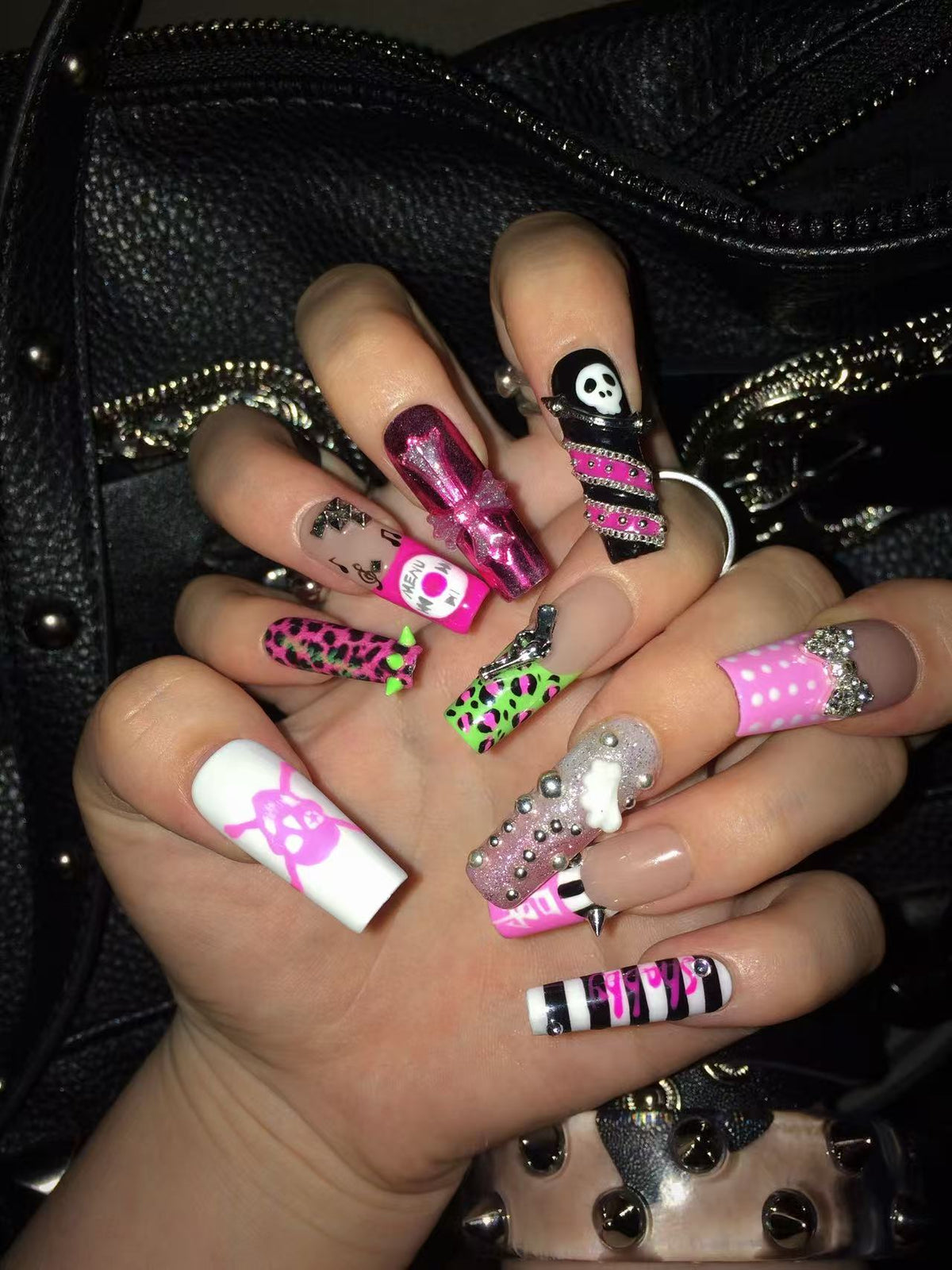 Original press-on nails featuring a Y2K-inspired retro style with leopard print and studs