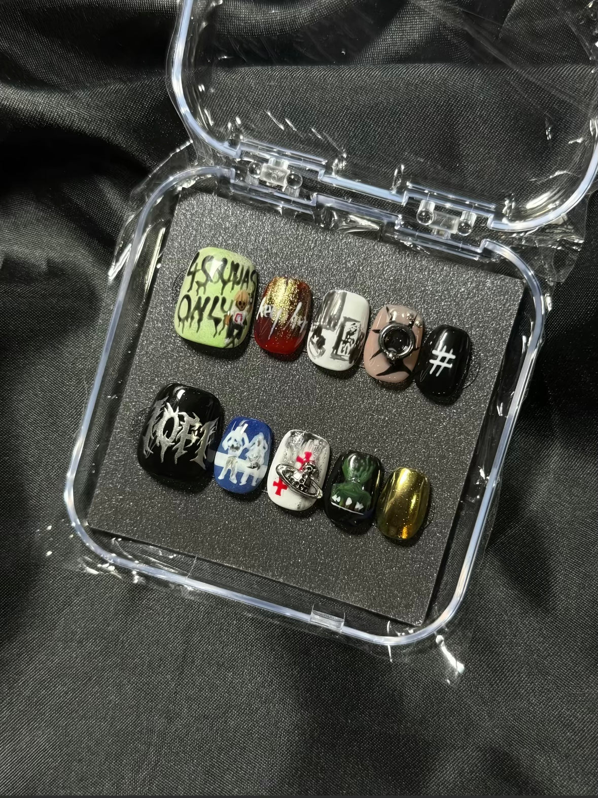 Press-on nails inspired by the Devstacks album cover